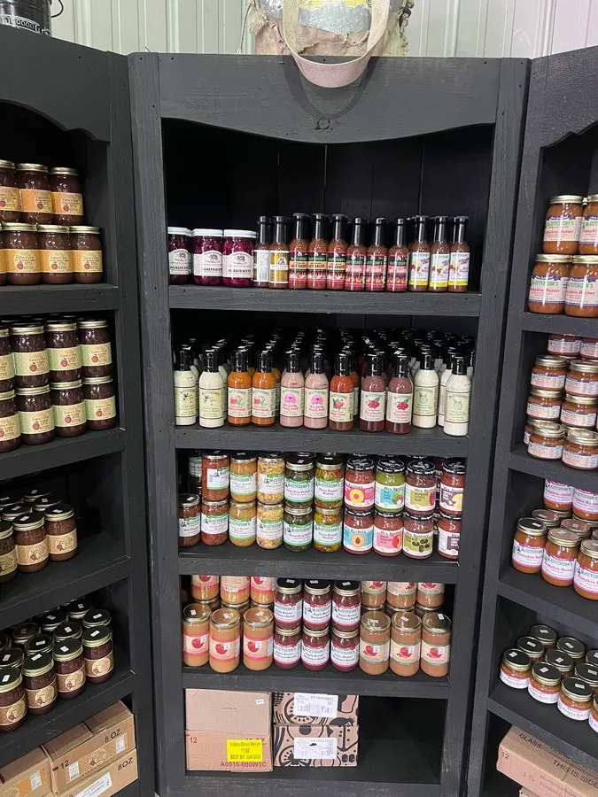 Shelves of apple butter, cider, salsas and other dry goods at The Apple Barn